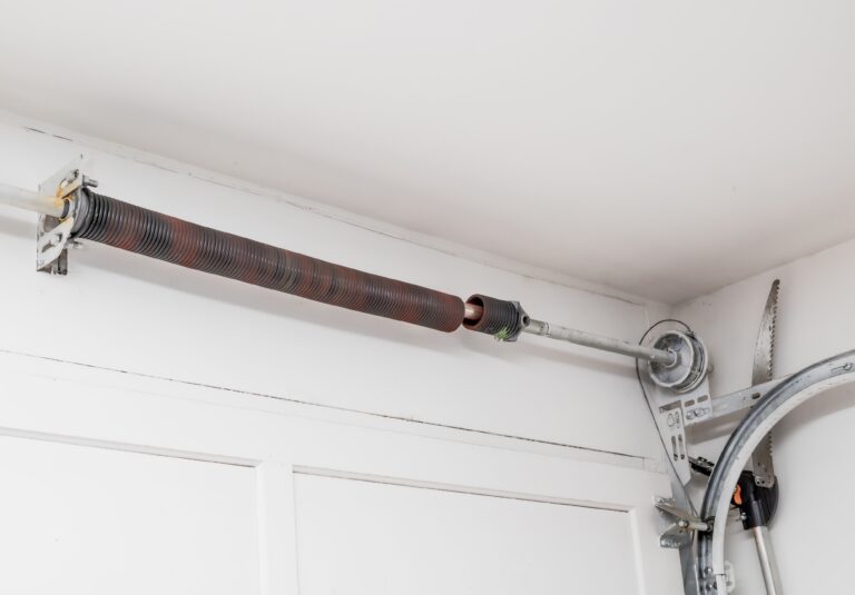 broken torsion spring on a garage door